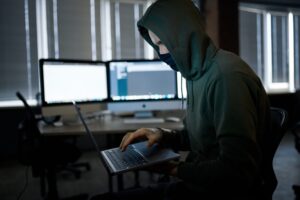 Hacker performing a ransomware attack